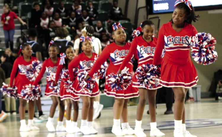 The Putnam County cheerleaders performed during halftime in the Centennial Center. TREY NORRIS/Staff