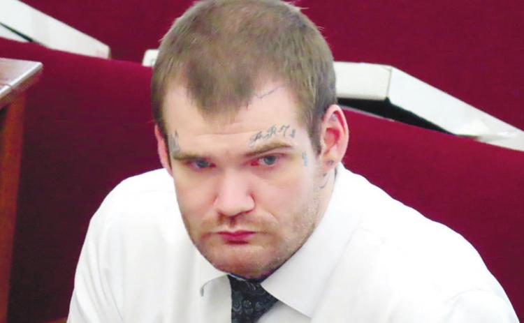 Defendant Ricky Dubose watches opening statements in Putnam County . COURT POOL COVERAGE