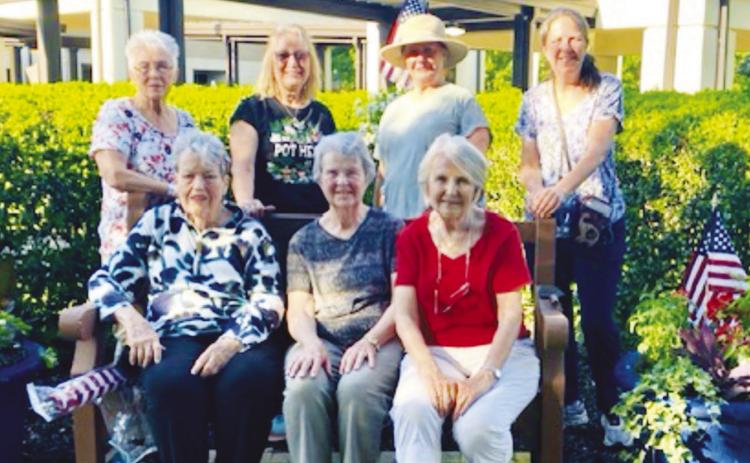 Pictured are garden club members who participated in the planting project: (front) Harriett Whipple, Carol McRae and Sue Wright; (back) Elaine Alton, Gail Wirth, Kathy Smith and Krista Kugaraj. CONTRIBUTED