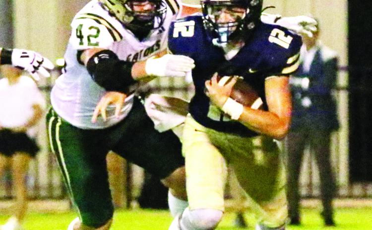 JMA quarterback David Todd (right) has been filling in for injured starter Kolt McMichael for several weeks, but Todd is now questionable to start this Friday at Tatnall Square Academy in Macon. TREY NORRIS/Staff