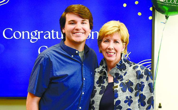 Colin Hall and GCSU President Cathy Cox pose together during a reception informing Hall that he won the Truman Scholarship. CONTRIBUTED