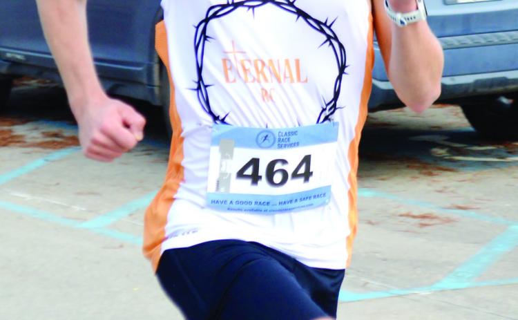 Autumn Dash overall winner, Jack Sisk, dashes toward the finish line. CONTRIBUTED