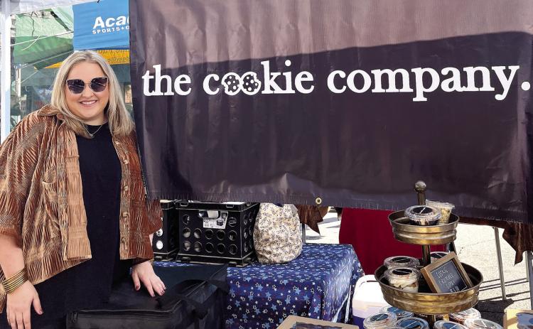 Kaitlin Tollison, owner of The Cookie Company, at the annual Deep Roots Festival on Saturday, Oct. 19 in downtown Milledgeville. PRESLEIGH PILGRIM/Staff