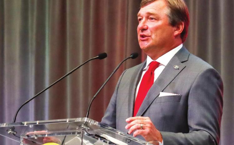 Georgia head coach Kirby Smart speaks at the main stage podium on Wednesday at SEC Media Days. BRENDAN KOERNER/Staff