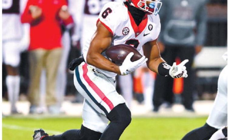 Georgia running back Kenny McIntosh (6) has 568 rushing yards on the season and 7