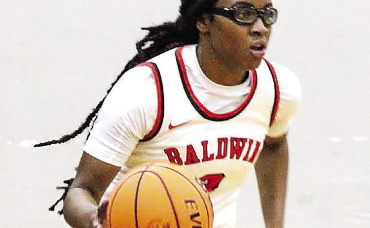 Madison Ruff (4) had a team-leading four steals and eight assists in a strong defensive effort for the Bravettes last Tuesday. TREY NORRIS/ Staff