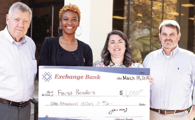 Exchange Bank presents the $1,000 check to Ferst Readers of Baldwin County. CONTRIBUTED