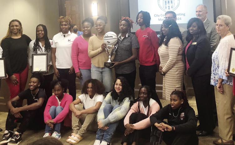 Milledgeville City Council honors the Baldwin Bravettes for winning the 2024 Girls GHSA Class AAAA Basketball State Championship. GREENBERRY MOORE/Staff