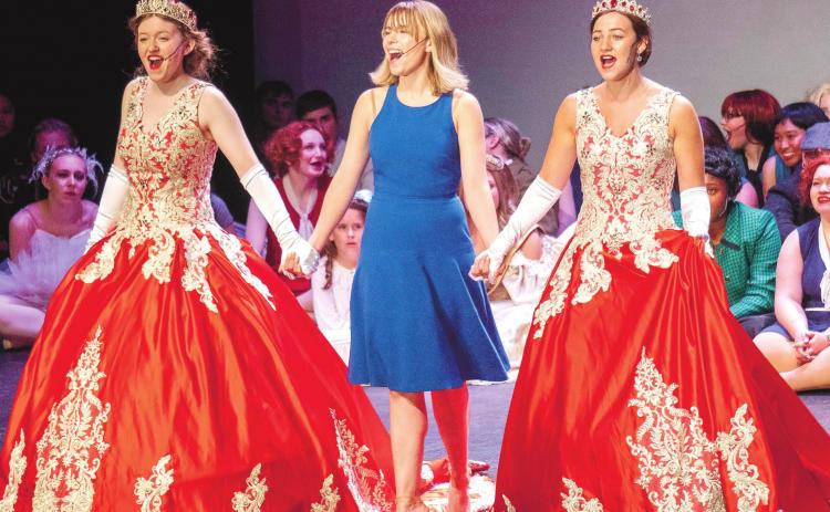 Broadway star Lila Coogan (center) performs a song from “Anastasia” with students from the GMC Prep High School theatre group. CONTRIBUTED