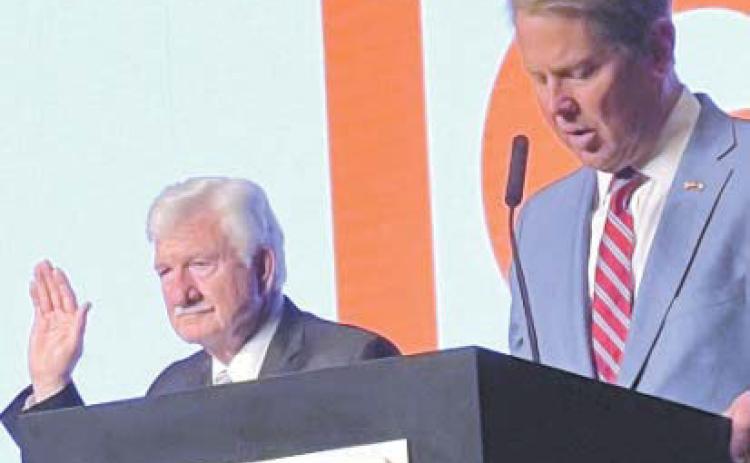 Georgia Gov. Brian Kemp swears in Henry Craig as president of the Association of County Commissioners of Georgia. CONTRIBUTED