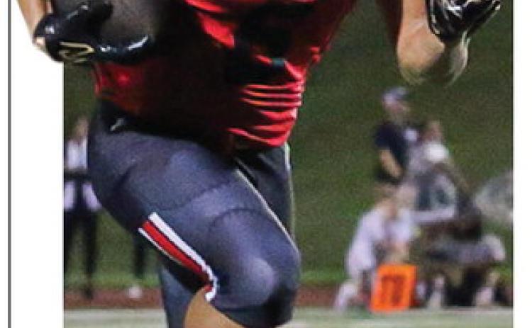 Wide receiver Justin Burton turned on the Baldwin jets on a 67-yard touchdown reception last Friday night against Dublin in the game’s final minutes. TREY NORRIS/File photo