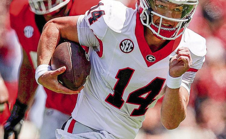 Georgia quarterback Gunner Stockton took the podium on Tuesday, July 15, to meet with reporters at the 2025 SEC Media Days event to discuss the upcoming season. Courtesy of UGA Athletics