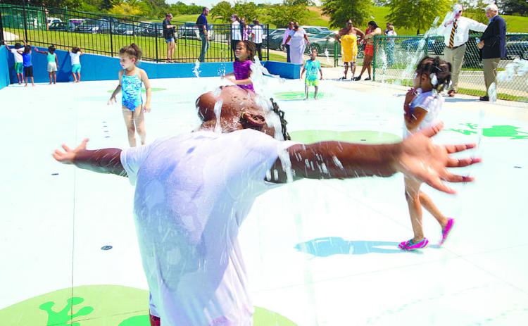 ELC students play in the water after learning about water safety. 