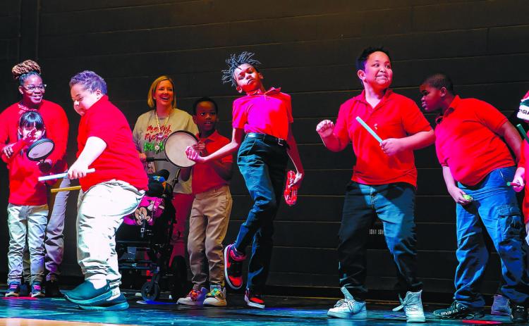 The music therapy program allows the Program for Exceptional Children to perform on stage and show off their amazing talent.