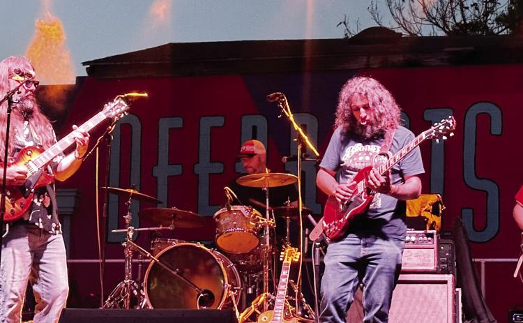 The Restless Natives played soulful Southern rock throughout their set on the Deep Roots stage in downtown Milledgeville. Scan the QR code to view highlights of the festival.