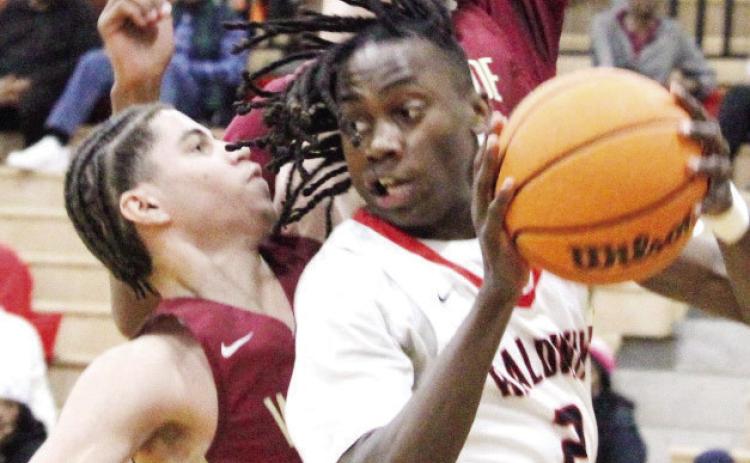 Karez Demory (2) was Baldwin’s third-highest scorer on Tuesday with 15 points in the Braves’ region playoff win over Westside. TREY NORRIS/File Photo