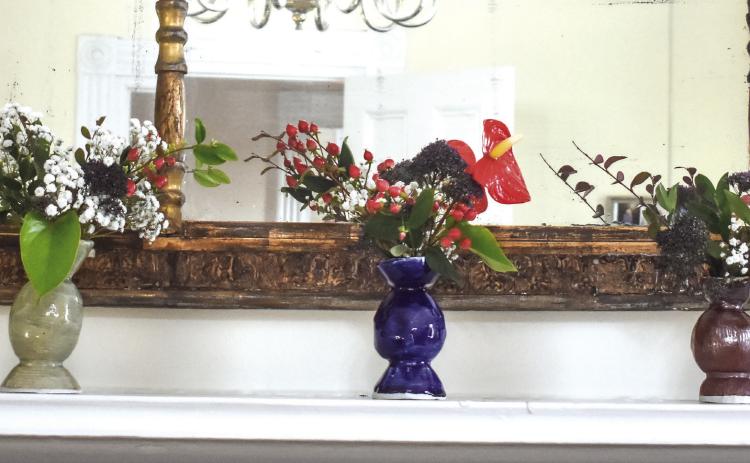 “Life of a Flower” showcased many ceramic pots with live flowers inside throughout the Marlor House. The ceramic pots on the mantle piece were aligned to visually showcase the life cycle of a flower and its slow process of decay.