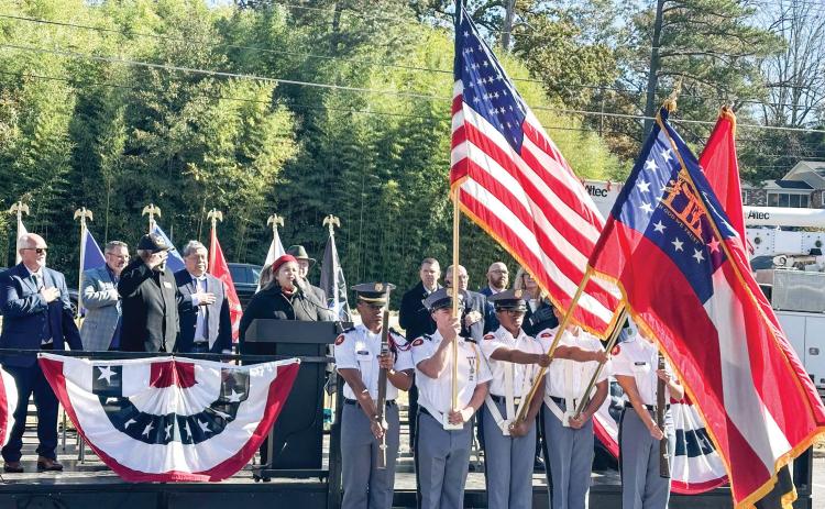 The Georgia Military College Corps of Cadets presented the colors during the opening of the ceremony at the Georgia War Veterans Home. Scan the QR code above to watch the veterans platoon that paraded in front of the stage. ALIVIA BLANTON/Staff