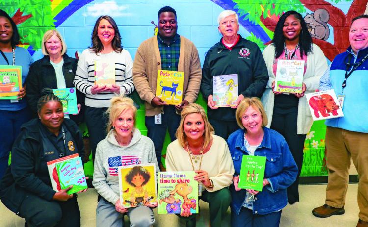 A team of readers at the Early learning Center who volunteer through Georgia College’s Communities in Schools program. COURTESY OF GCSU