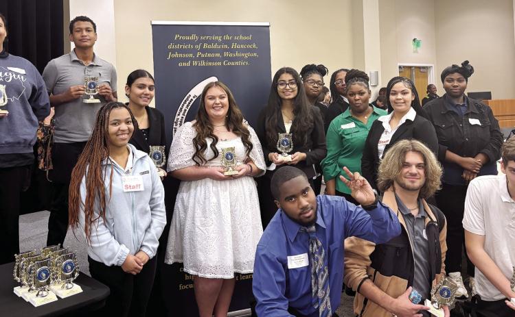 Members of the Baldwin County High School team pose with their trophies at the Oconee RESA Regional Technology Fair Competition at Central Georgia Technical College. CONTRIBUTED